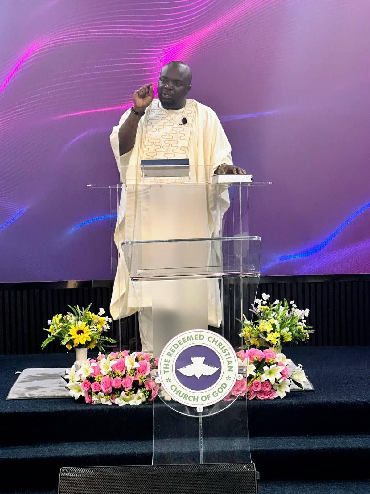 A minister preaching at RCCG Living Faith Sunderland