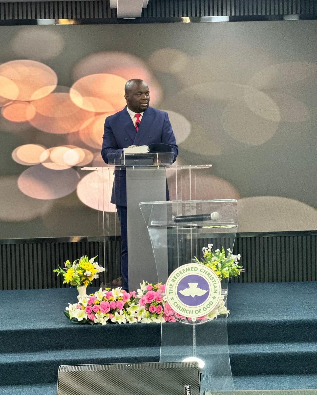 A minister preaching at RCCG Living Faith Sunderland