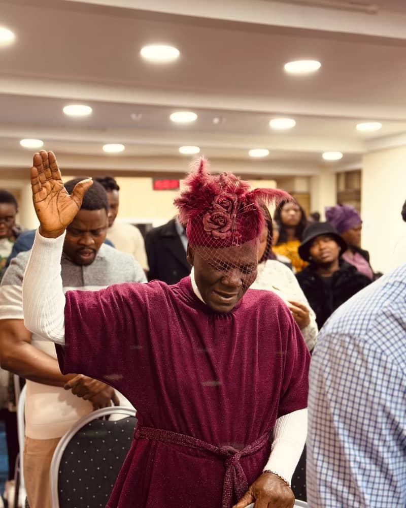 A member in worship and prayer at RCCG Living Faith Sunderland
